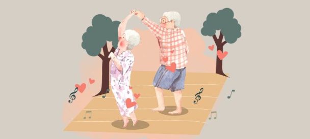 Grafika przedstawia parę tańczących seniorów na kocu. W tle dwa drzewa i unoszące się nuty.